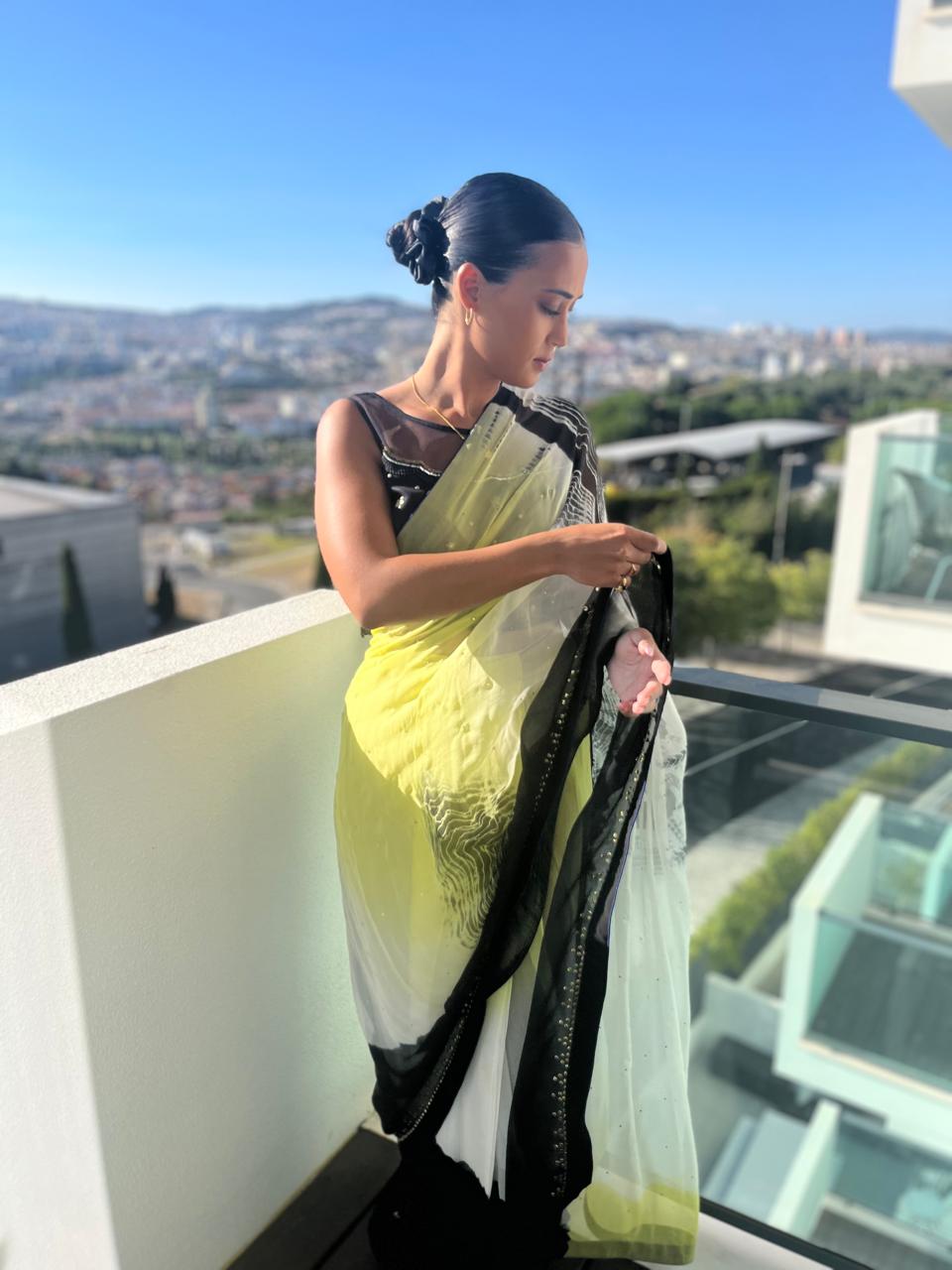 Lime yellow and white chiffon saree with black blouse